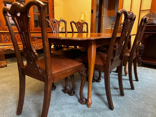 Vintage Dinning table extendable $150 with 6 refurbished leather chairs $100 each