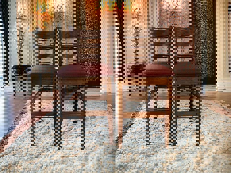 A pair of high chairs bar chairs solid timber