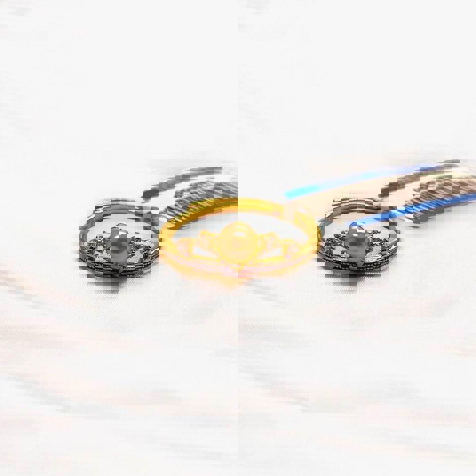 Elegant Gold Ring with Natural Seawater Gold Pearl and Accent Stone in S925