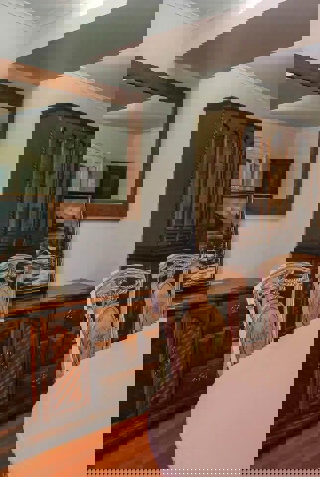 Antique white French dinning table with 6 matching chairs with glass top