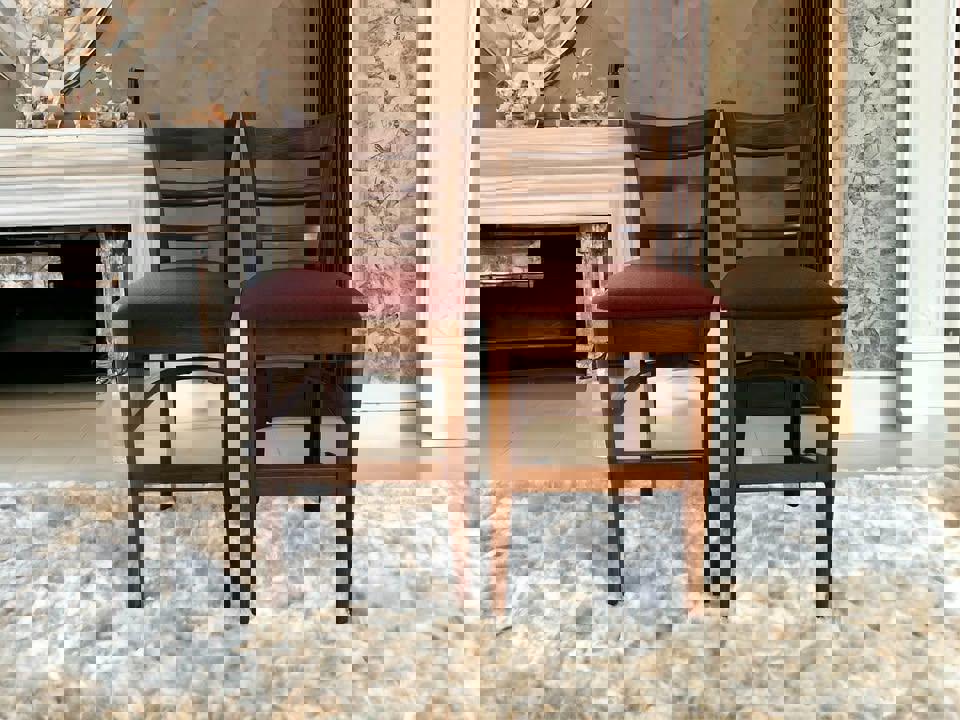 A pair of high chairs bar chairs solid timber