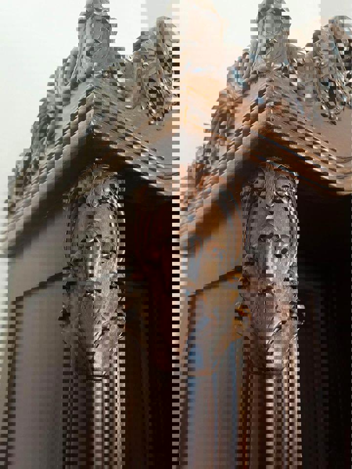 Elegant Vintage Wooden Bookcase with Intricate Carvings