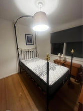 Load image into Gallery viewer, Antique king single iron frame over 100 years $500 with nearly new mattress
