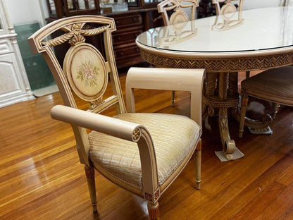Antique white French dinning table with 6 matching chairs with glass top