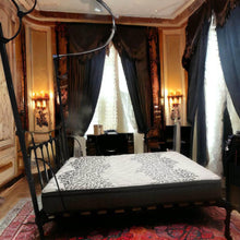 Load image into Gallery viewer, Antique king single iron frame over 100 years $500 with nearly new mattress

