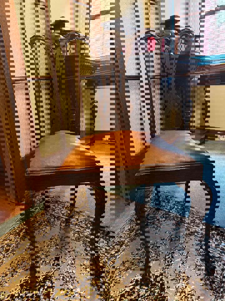 Vintage Dinning table extendable $150 with 6 refurbished leather chairs $100 each