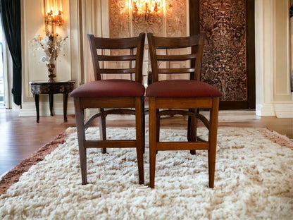 A pair of high chairs bar chairs solid timber