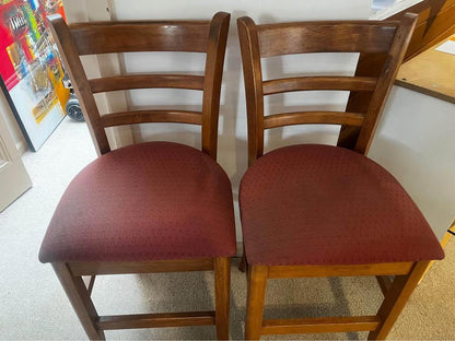 A pair of high chairs bar chairs solid timber