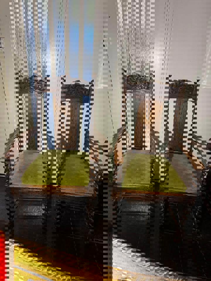 A pair of Antique solid timber chair excellent condition green velvet