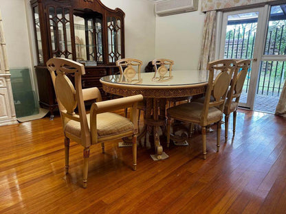 Antique white French dinning table with 6 matching chairs with glass top