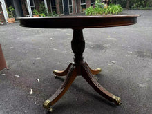 Load image into Gallery viewer, 1.1m vintage round table $150 solid timber with brass wheels and matching large anchors $150 each
