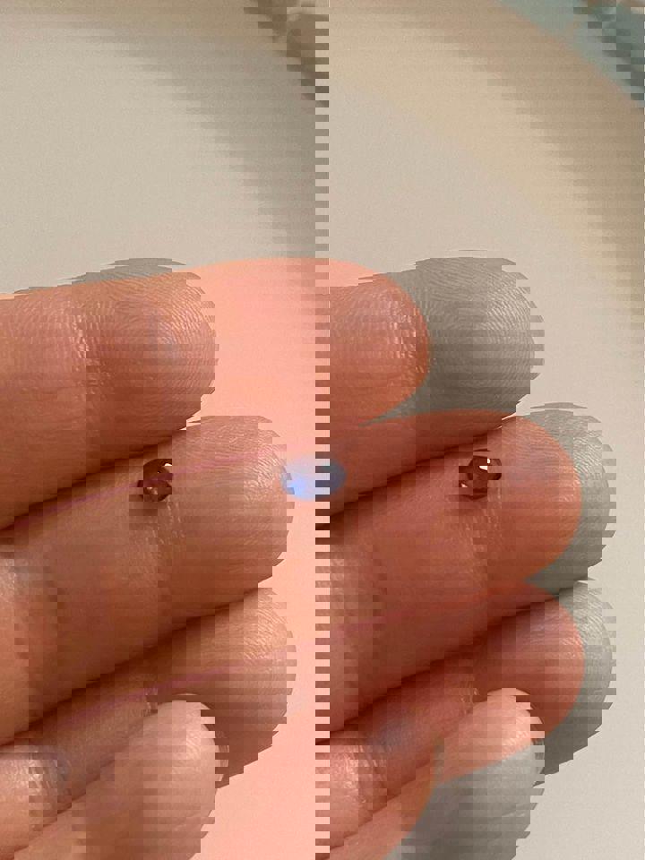 0.5 ct natural cornflower blue sapphire Sri Lanka region with certificate oval shape