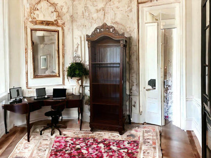 Elegant Vintage Wooden Bookcase with Intricate Carvings