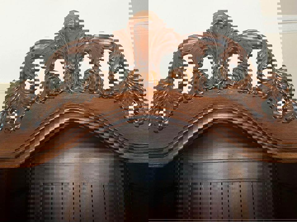 Elegant Vintage Wooden Bookcase with Intricate Carvings