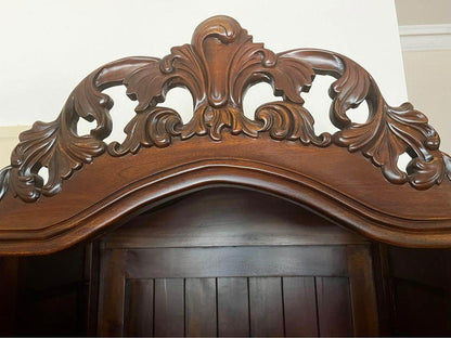 Elegant Vintage Wooden Bookcase with Intricate Carvings